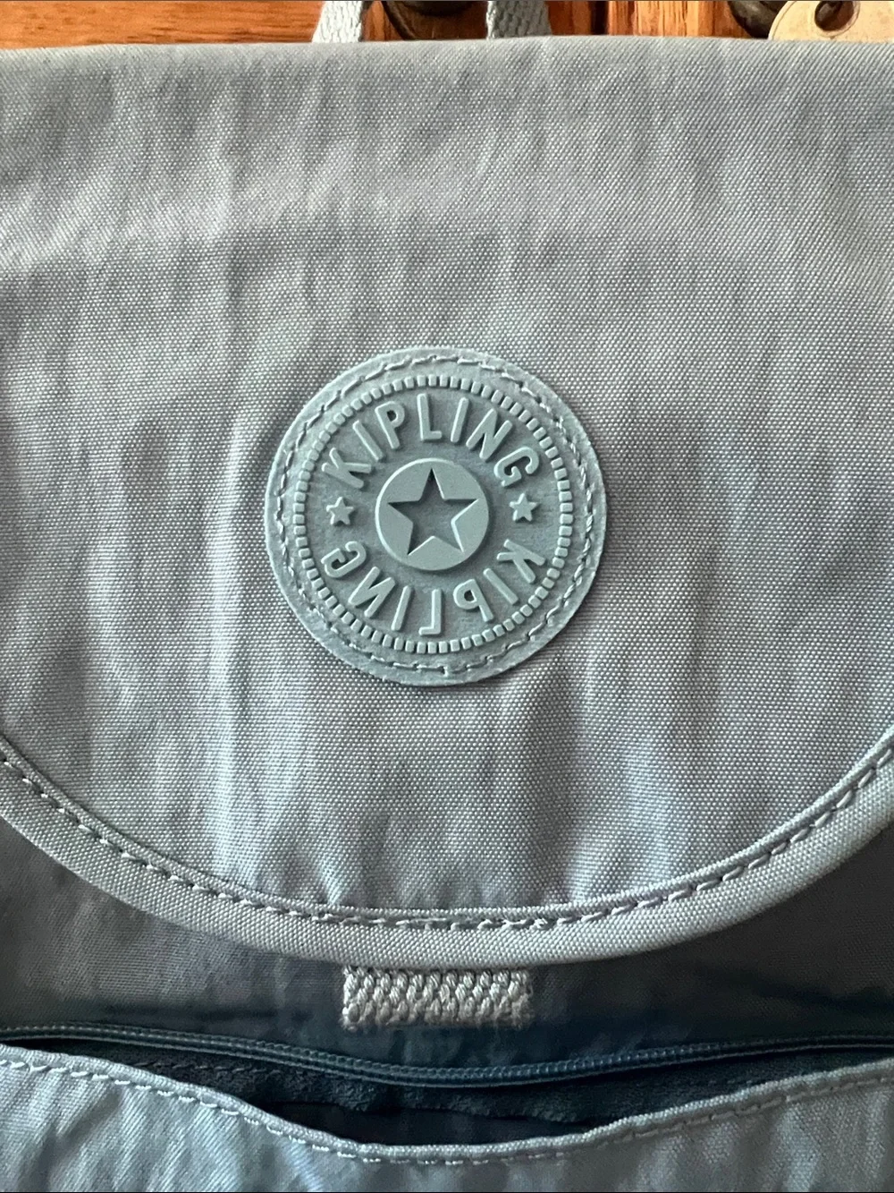 Kipling Dusty Blue Nylon Mini Backpack with monkey bag Charm